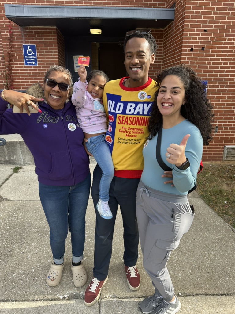Stephon Dingle with his great-aunt Deborah, wife Cathy and daughter Devyn after voting in 2024.