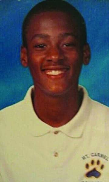 Stephon Dingle as a sophomore at Our Lady of Mount Carmel High School, wearing a school polo.